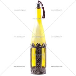 Bouteille jaune en verre orné en métal ou cuivre 100% marocaine.